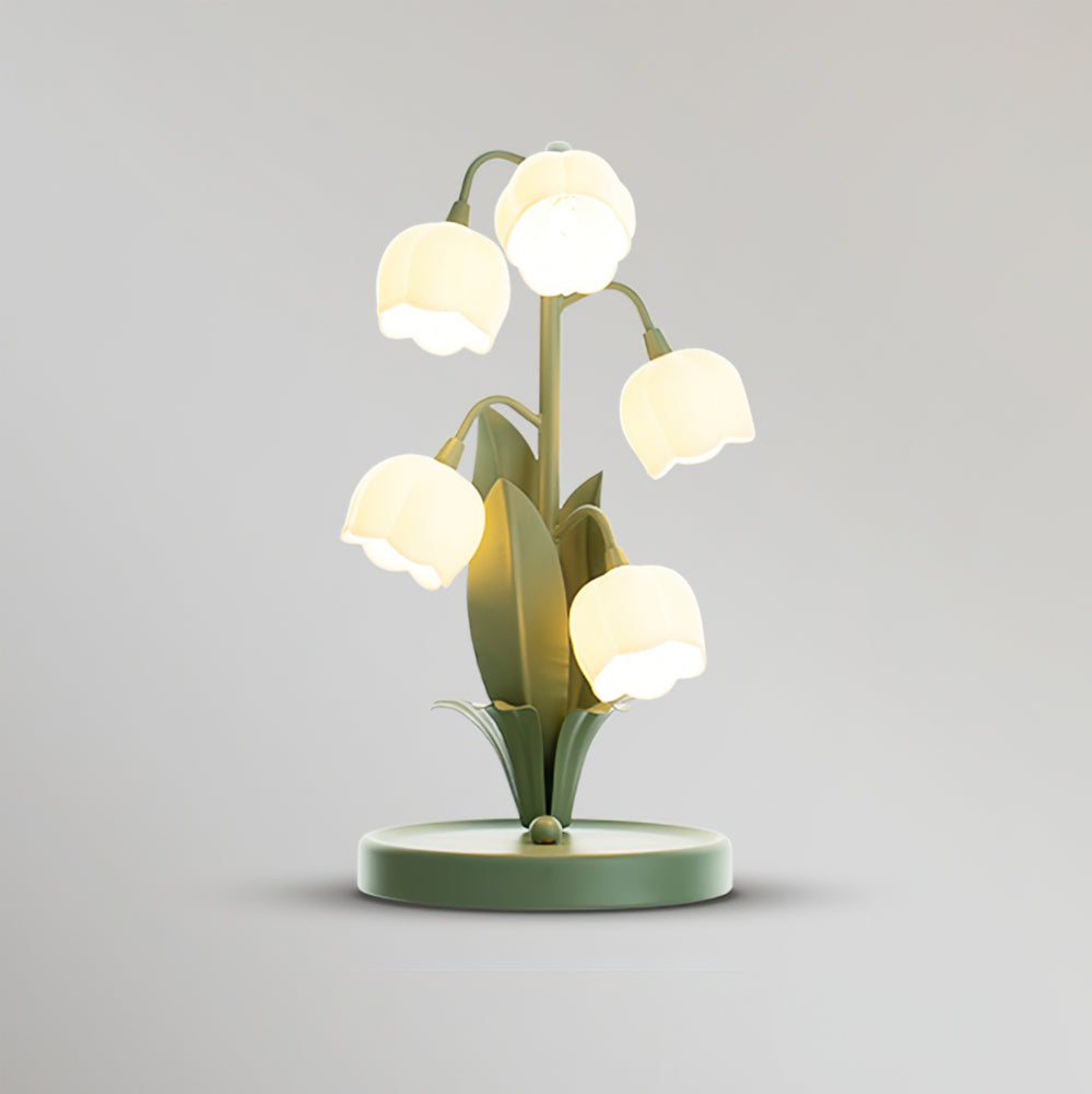 Tischlampe in Tulpenform mit Orchideenblüte