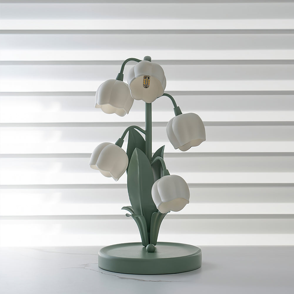 Tischlampe in Tulpenform mit Orchideenblüte