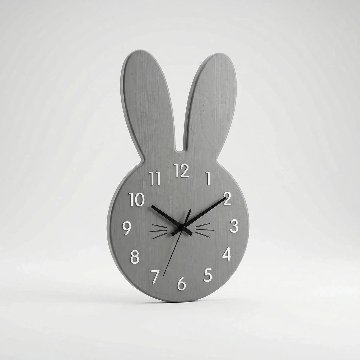 Verspielte nordisch-skandinavische leise Wanduhr mit Hasensilhouette