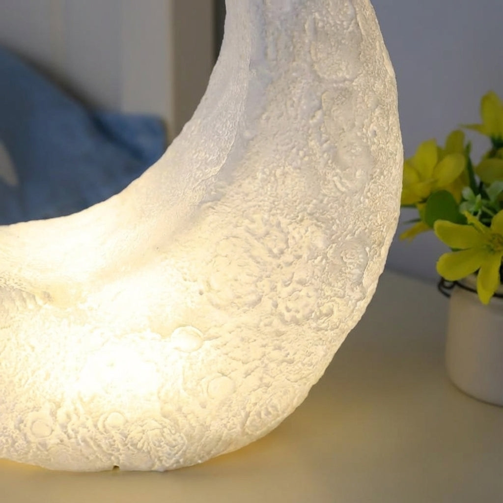Tischlampe mit Art-déco-Mondsichel-Silhouette, kabellosem Design und mattem Lampenschirm