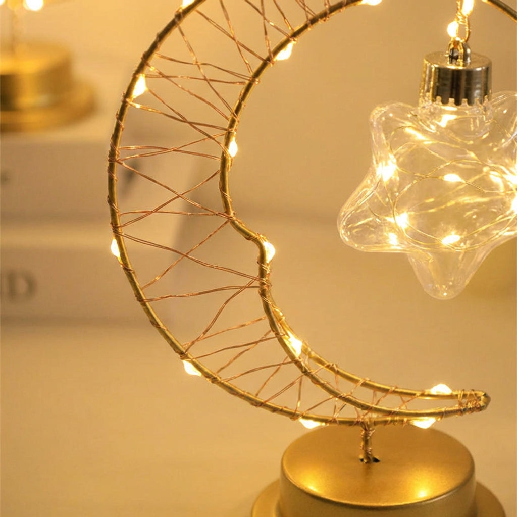 Dimmbare Hängetischlampe mit geschwungener Mondsilhouette und gläsernem Stern