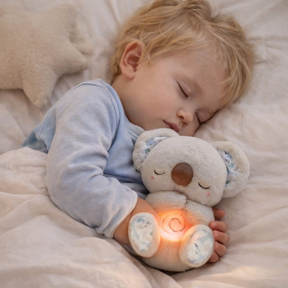 Set mit rhythmisch atmendem Leucht-Plüschbären als Schlafspielzeug für Babys