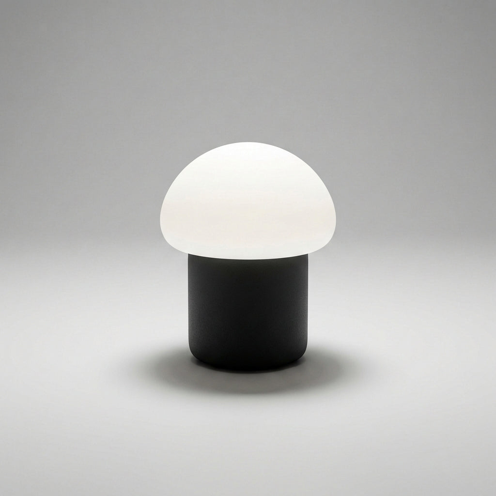 Minimalistische kompakte Tischlampe in Pilzform mit beschwertem Fuß