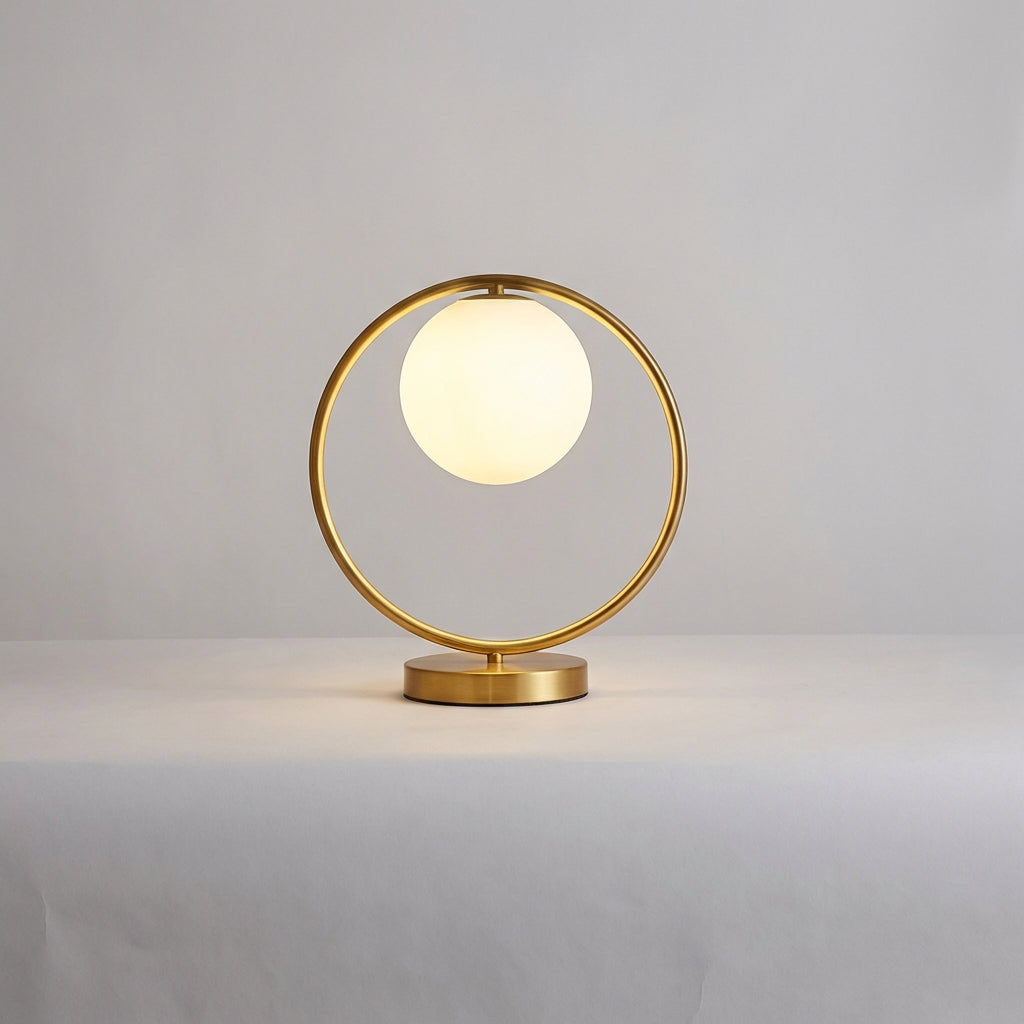 Skulpturale dimmbare Tischlampe mit Ring-Silhouette und hängender Glaskugel
