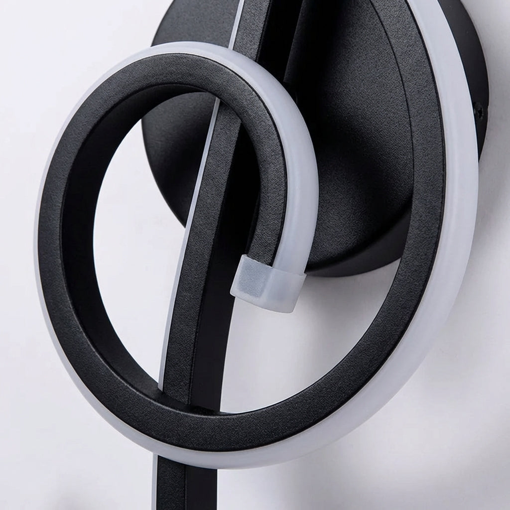Skulpturale Wandleuchte aus Aluminium und Acryl in Form eines Violinschlüssels mit Dimmer