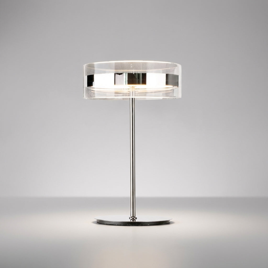 Elegante Tischlampe mit zylindrischem Klarsichtschirm und schlankem Stab