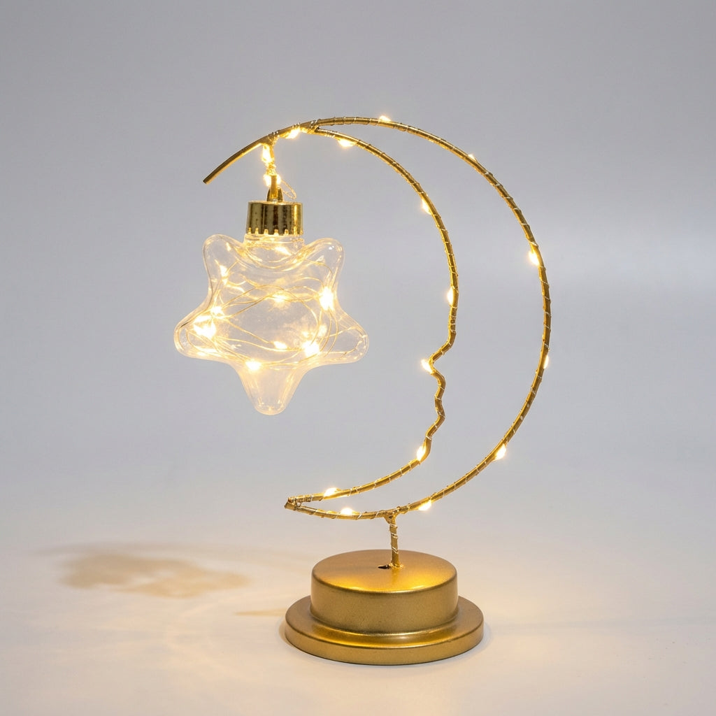 Dimm­bare Hängetischlampe mit geschwungener Mondsilhouette und gläsernem Stern