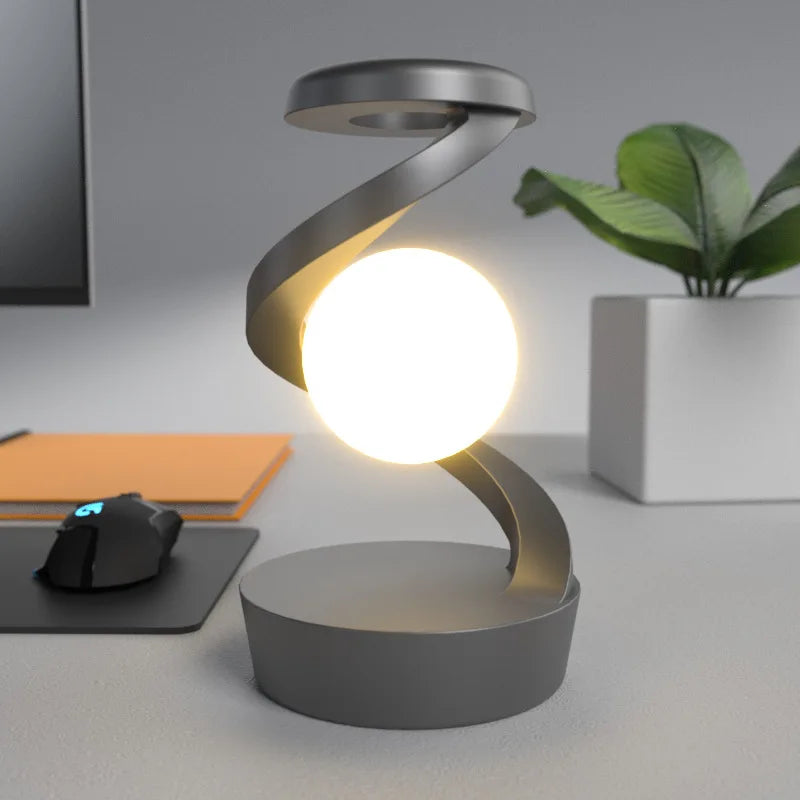 Tischlampe mit spiralförmigem Arm, Kugelschirm, Gestensteuerung und kabelloser Ladefunktion
