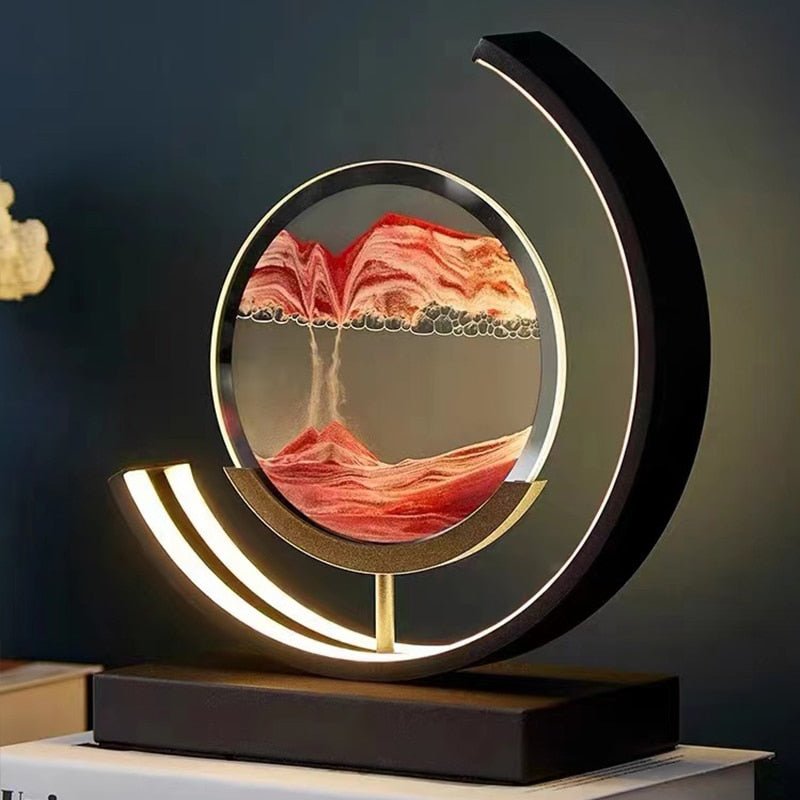 Tischlampe mit rotierender Sandkunst-Skulptur und stimmungsvoller Beleuchtung