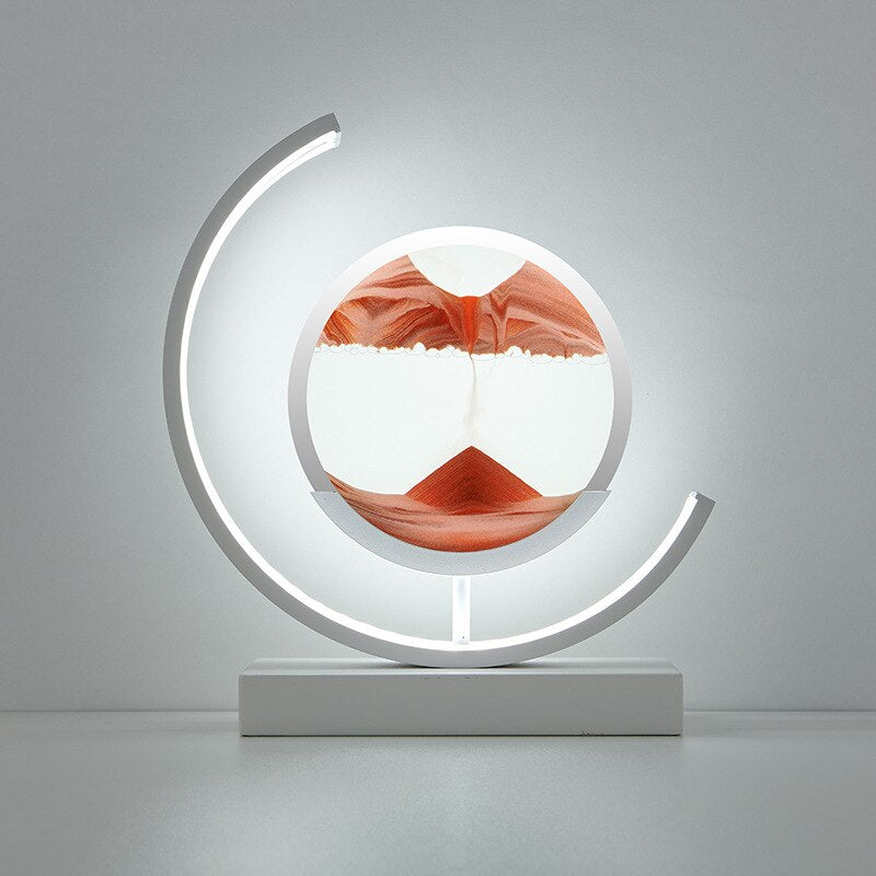 Tischlampe mit rotierender Sandkunst-Skulptur und stimmungsvoller Beleuchtung