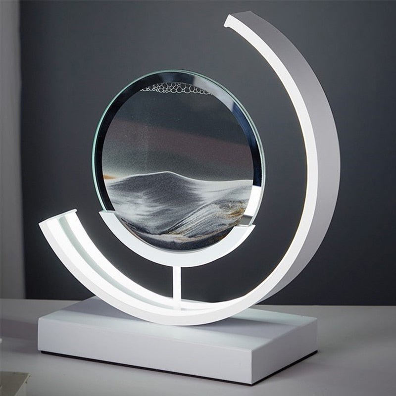 Tischlampe mit rotierender Sandkunst-Skulptur und stimmungsvoller Beleuchtung