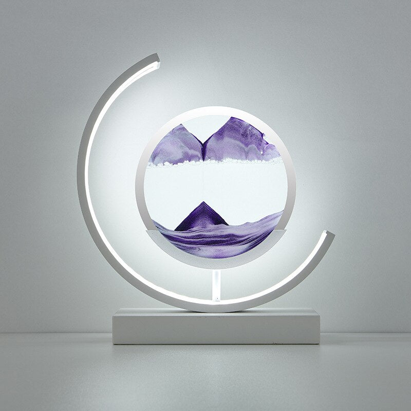 Tischlampe mit rotierender Sandkunst-Skulptur und stimmungsvoller Beleuchtung
