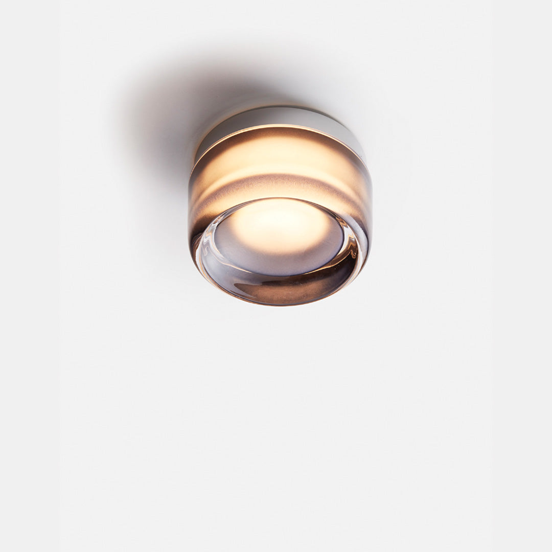 Moderne Wandleuchte aus Metall und Glas mit einstellbarem Lichtton