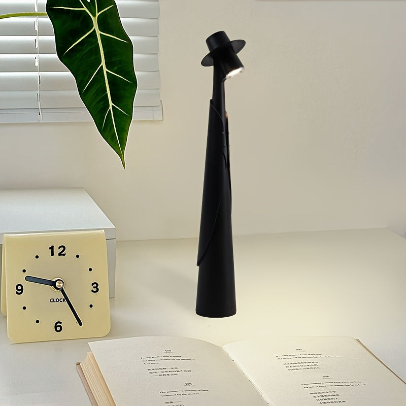 Skulpturale Tischlampe als Hutsilhouette mit Akku und Touch-Steuerung